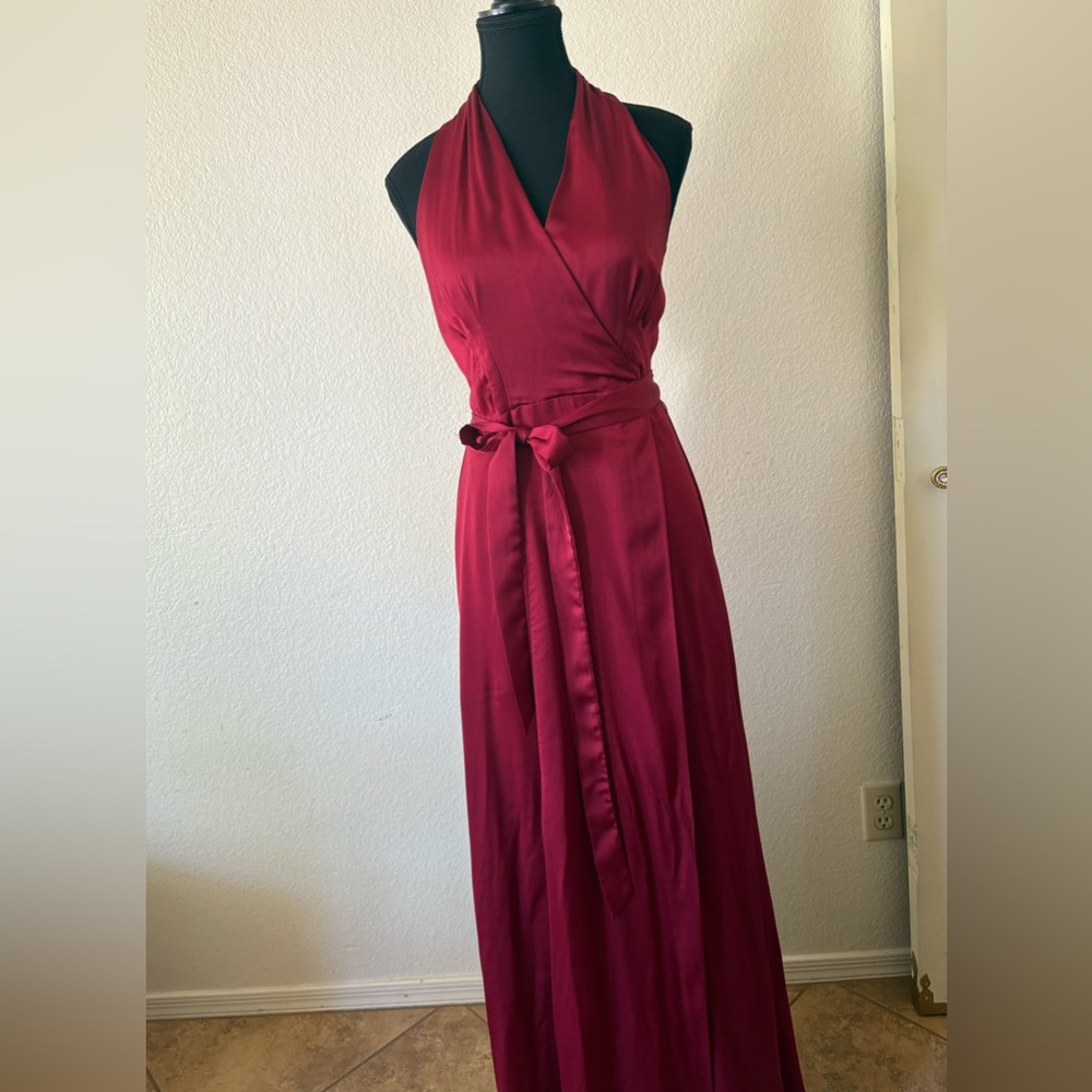 Burgundy maxi dress with a halter neck and adjustable tie belt #glam #regency